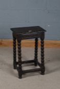 17th century style oak joint stool, the top above a carved frieze, raised on bobbin turned legs