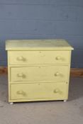 Yellow painted pine chest, fitted three long graduating drawers, 80cm wide, 76cm high, 42cm deep