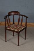 Edwardian mahogany and inlaid corner chair, with shaped back rest and upholstered seat