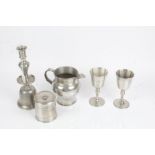 Pewter ware, to include candlestick, jug, pot and cover, pair of goblets (5)