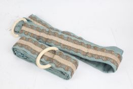A pair of long Victorian country house embroidered servants’ bell pulls, the turquoise silk pulls