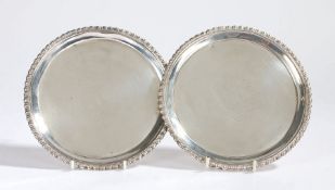 Pair of early George III silver card trays, London 1763, maker Ebenezer Coker, with gadrooned