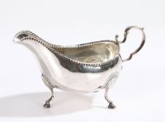 George III Irish silver sauceboat, Dublin 1786, maker Matthew West, with roundel punched rim and
