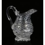 Early 19th Century glass water jug, in the form of a pineapple, the layered body above the husk