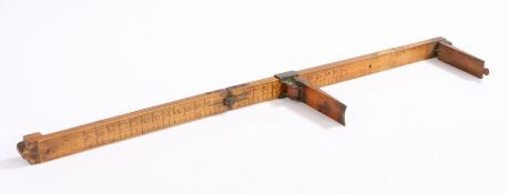 A 19th Century F.B Fox foot measure, in boxwood