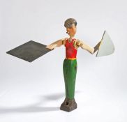 Folk Art, a Whirly Gig, polychrome painted figure of a man with a large cigar and flat cap holding