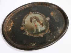 19th Century painted tray, centred by a spaniel with a red tassel bow, 61cm wide