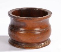 19th Century lignum vitae pot, of dumpy baluster shape, 11cm wide
