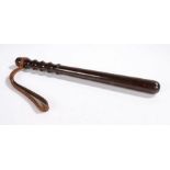 Turned police truncheon, with a leather strap to the handle, 40.5cm long