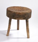 19th Century rustic stool/chopping block, the drum top with multiple nails and tails imbedded to the