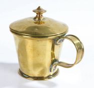 19th Century brass cup and cover, with an arched handle, 11cm high