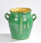 French Confit pot, in green exterior glaze and yellow interior glaze, twin handles to the side, 28cm
