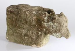 Zoomorphic carved stone rain water spout, with an animal head to the front, 51cm long