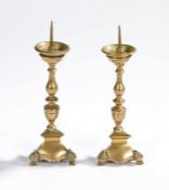 Pair of brass miniature pricket sticks, with spike tops above the  turned columns and triangular