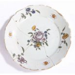 19th Century French Faience plate, polychrome decorated with flowers and insects, AF, 23cm diameter