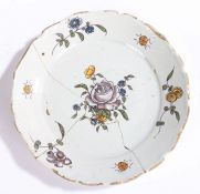 19th Century French Faience plate, polychrome decorated with flowers and insects, AF, 23cm diameter