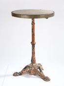 19th Century bistro table, the circular marble top above an iron column and dolphin scroll legs,
