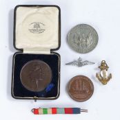 Bronze medallion to the 2nd Battalion Royal Sussex Regiment, regimental badge to the obverse  and
