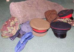 Kit bag containing assorted hats, military and civilian, (qty)