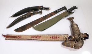 Ornamental Arab Janbiya with belt, together with two ornamental Kukris, and two machetes, (5)