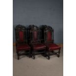 Set of six Victorian oak dining chairs, with mythical winged creature carved cresting rails, crimson