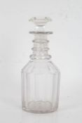 George III glass decanter, the octagonal stopper above a ringed neck, multi faceted body and star
