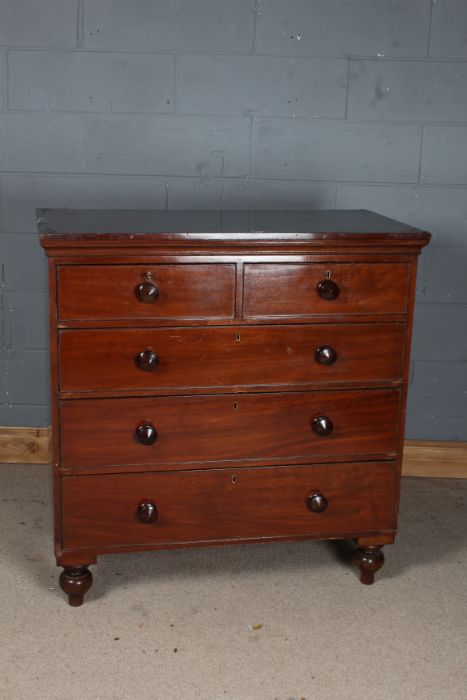 Victorian mahogany chest of two short and three long drawers, raised on turned feet, 107cm wide,