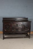 18th Century style oak dresser, the shaped upstand above two drawers flanked by two cupboard