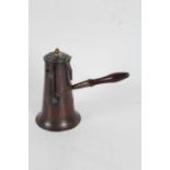 George III copper chocolate pot, circa 1770, with turned wooden side handle to the tapering body,