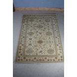 Royal Keshan wool carpet, the cream ground with foliate decoration, 240cm x 170cm