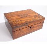 Regency satinwood and rosewood work box, the rectangular lid inlaid with rosewood foliate spandrels,