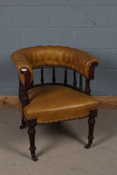 Victorian tan leatherette desk chair, the curved button back above spindle turned supports and
