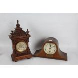 Late Victorian walnut mantle clock, of architectural form, twin train movement, 45cm tall (AF),