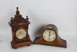 Late Victorian walnut mantle clock, of architectural form, twin train movement, 45cm tall (AF),