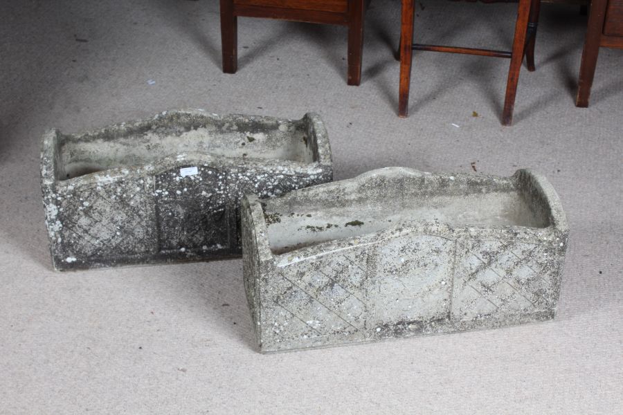 Pair of composite stone garden planters with a lattice effect to the sides, 62cm wide 24cm deep