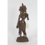 Indian bronze deity, modelled with left hand raised, 30cm high
