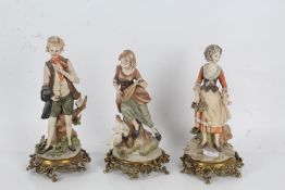 Three Capodimonte figures, to include a girl playing music for geese, a girl with basket of apples