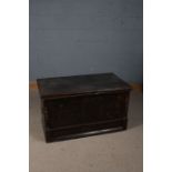 19th century stained pine chest, the hinged top enclosing a candle box interior, with traces of