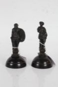 Pair of 19th Century Grand Tour bronze figures, one depicting a warrior with axe and shield, the