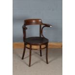 A.P.M. Polish bentwood elbow chair, with curved cresting rail and shell decorated seat, raised on