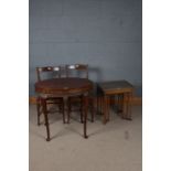Early 20th century mahogany table, having oval top above four slender legs with scallop moulding and