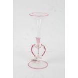 19th century Venetian clear glass vase, highlighted in cranberry, the trumpet shaped vase with three