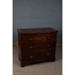 19th century mahogany bowfront chest, fitted three long drawers, raised in bracket feet, 102cm wide,