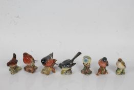 Seven Beswick birds 'Grey Wagtail', 'Goldcrest', 'Bullfinch', Blue Tit', 'Wren', 'Robin', and '