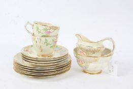 Quantity of Grosvenor china tea ware, decorated with colourful flowers, comprising two cups, four