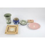 Wedgwood jasperware, to include green vase, and two ashtrays, blue ashtray, puce oval dish, blue