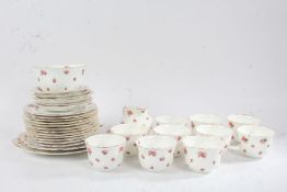 Royal Doulton Rosebud pattern part tea service, consisting of twelve cups (one AF) and saucers, a