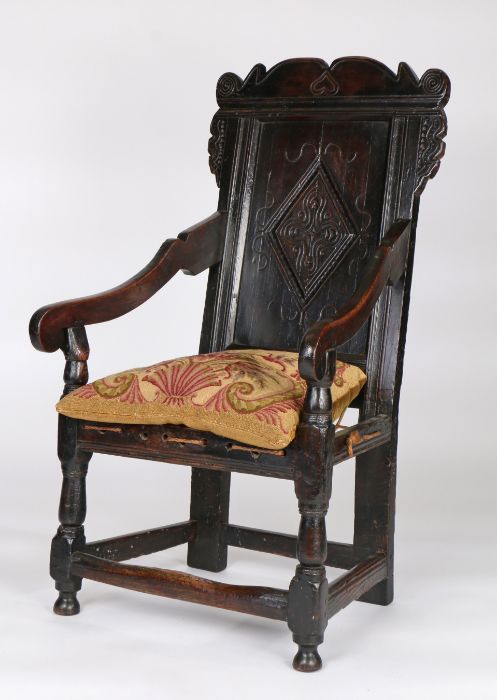 Charles II joined oak panel-back open armchair, Yorkshire, circa 1670, the back panel carved with - Image 5 of 6