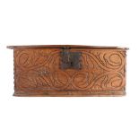 A 17th century oak boarded box, West Country, circa 1650, the rectangular one-piece top with chip