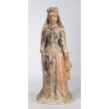 An interesting  limestone  and polychrome figure of a queen, possibly circa 1300, standing